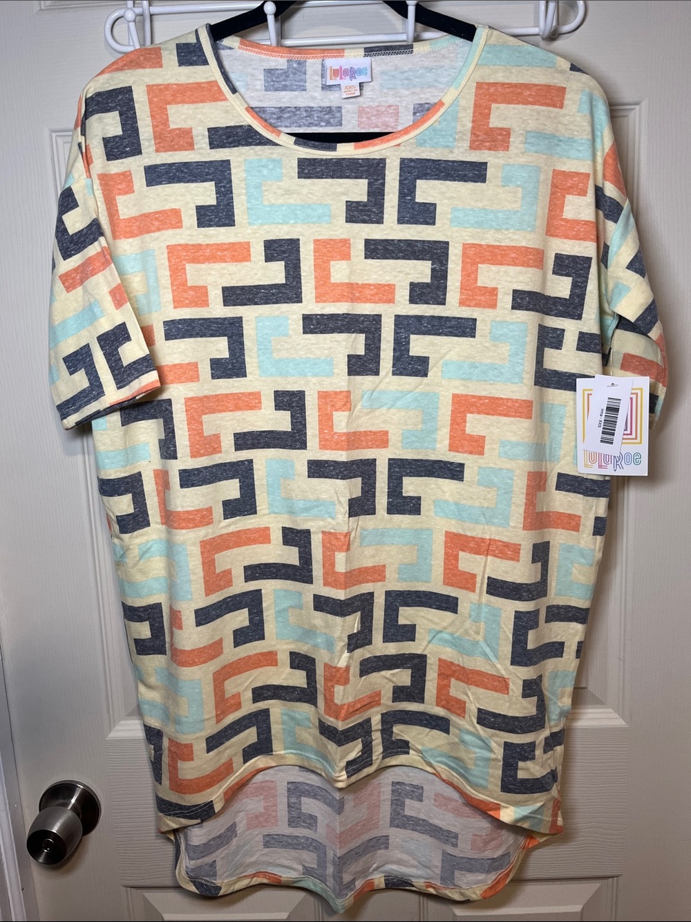 LuLaRoe Short Sleeve Irma Tunic in Cream, Coral, Teal & Charcoal Geometric Print